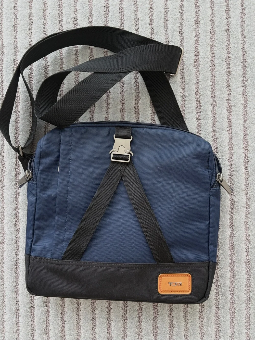 Tumi Navy and Black Crossbody with Tan Logo Patch